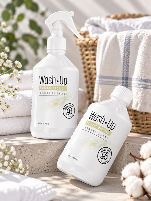 Parfum de linge Wash·Up Radiant Orchid 500 ml présenté avec vaporisateur et flacon dans une ambiance élégante et lumineuse.